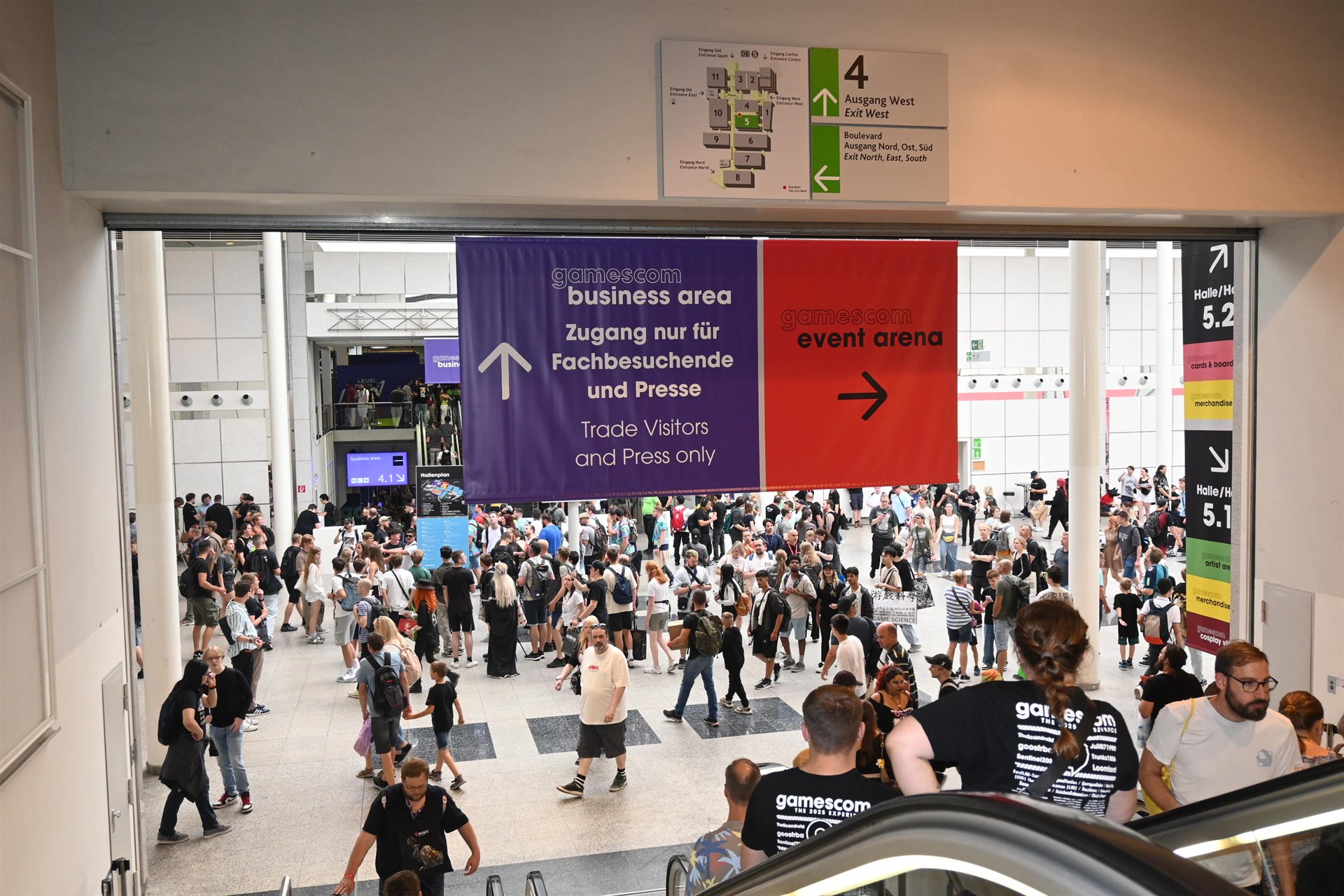 Visitors stream into the halls at Gamescom in Cologne.
